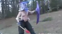 2 warriors battle it out with shovels, plastic sleds, and beer boxes as helmets. This is 9 of 12 for an over the top ridiculous series called “12 Inches of Johnson”